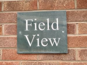 House sign- click for photo gallery